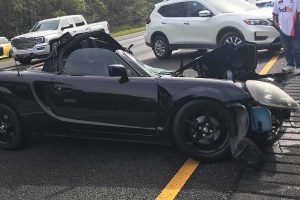 toyota-mr2-crashes-into-semi-truck