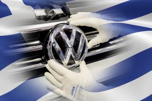 Assembly Wolfsburg plant: Installing the VW-emblem to the radiat