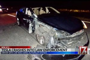 tesla on autopilot crashes into police car