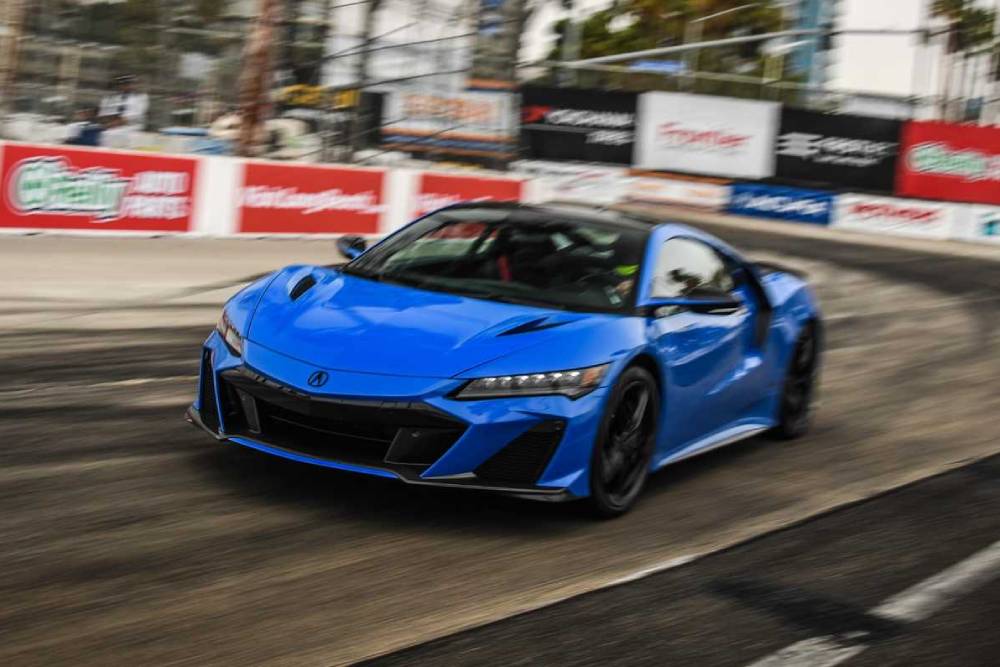 https://autogreeknews.gr/wp-content/uploads/2021/09/2022-acura-nsx-type-s-breaks-production-car-lap-re-1.jpg