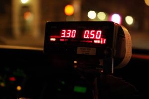 taxi meter running