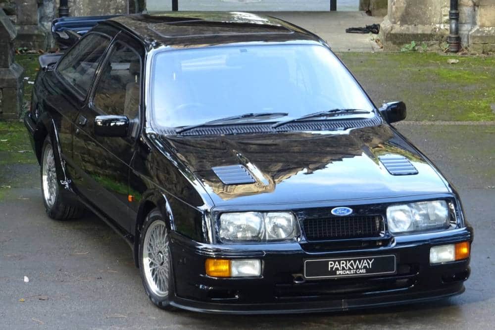 https://autogreeknews.gr/wp-content/uploads/2022/02/FORD_SIERRA_RS500_COSWORTH_2DR_24.jpg