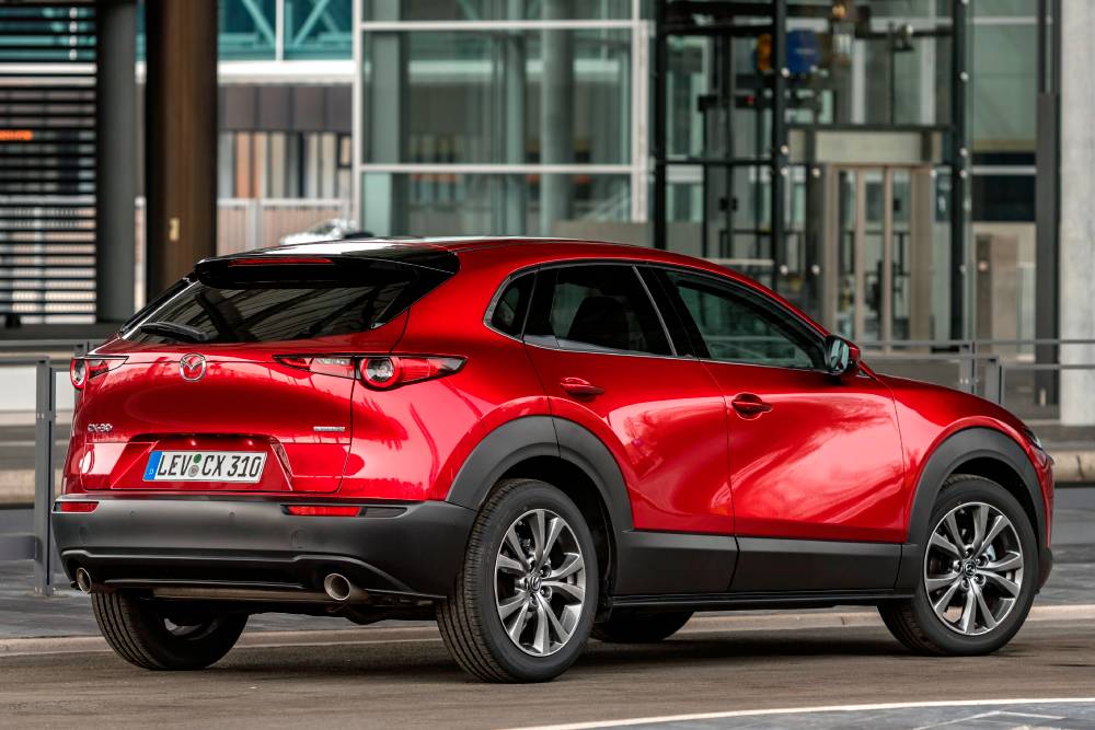 https://autogreeknews.gr/wp-content/uploads/2022/03/008-2022-mazda-cx-30-soul-red-crystal-exterior-031.jpg