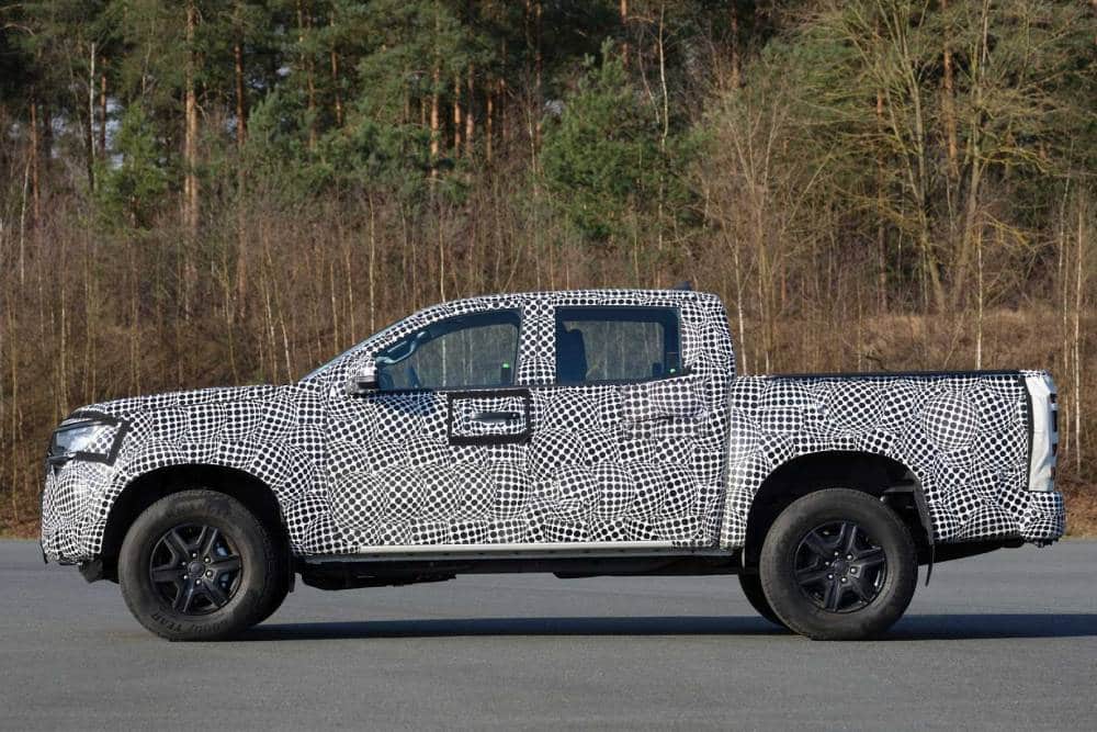 https://autogreeknews.gr/wp-content/uploads/2022/04/2023-vw-amarok-teaser-10.jpg