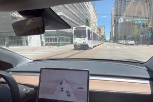 tesla autopilot turns onto tram