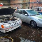 abandoned-peugeot-205-gti-sleeping-under-a-tarp-be (1)