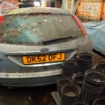 abandoned-peugeot-205-gti-sleeping-under-a-tarp-be (2)