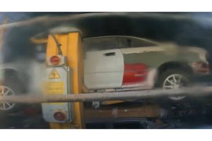 abandoned-peugeot-205-gti-sleeping-under-a-tarp-be (4)