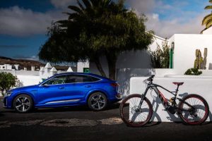 Audi SQ8 Sportback e-tron and Audi electric mountain bike powere