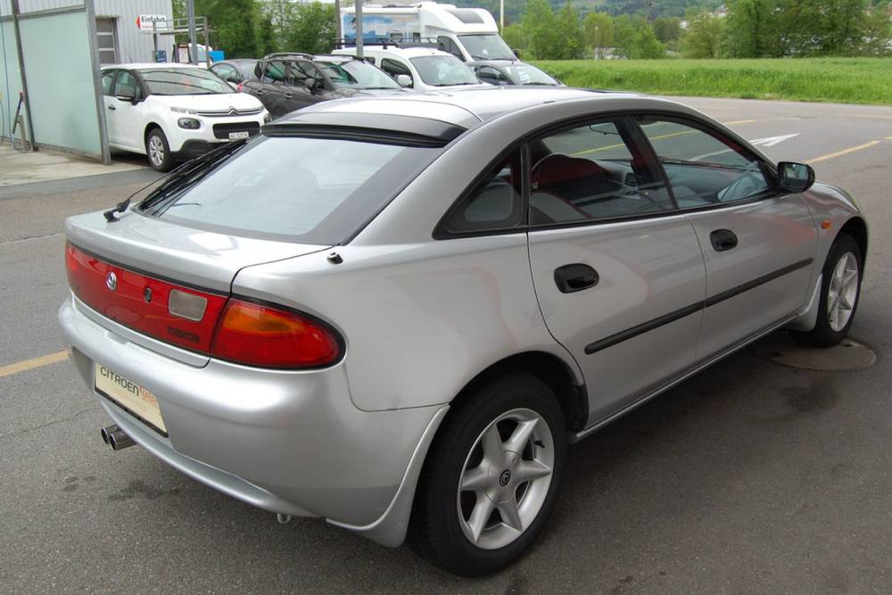 https://autogreeknews.gr/wp-content/uploads/2023/08/Mazda_323F_20i_24_V6_GT_1995_for_sale-8.jpg