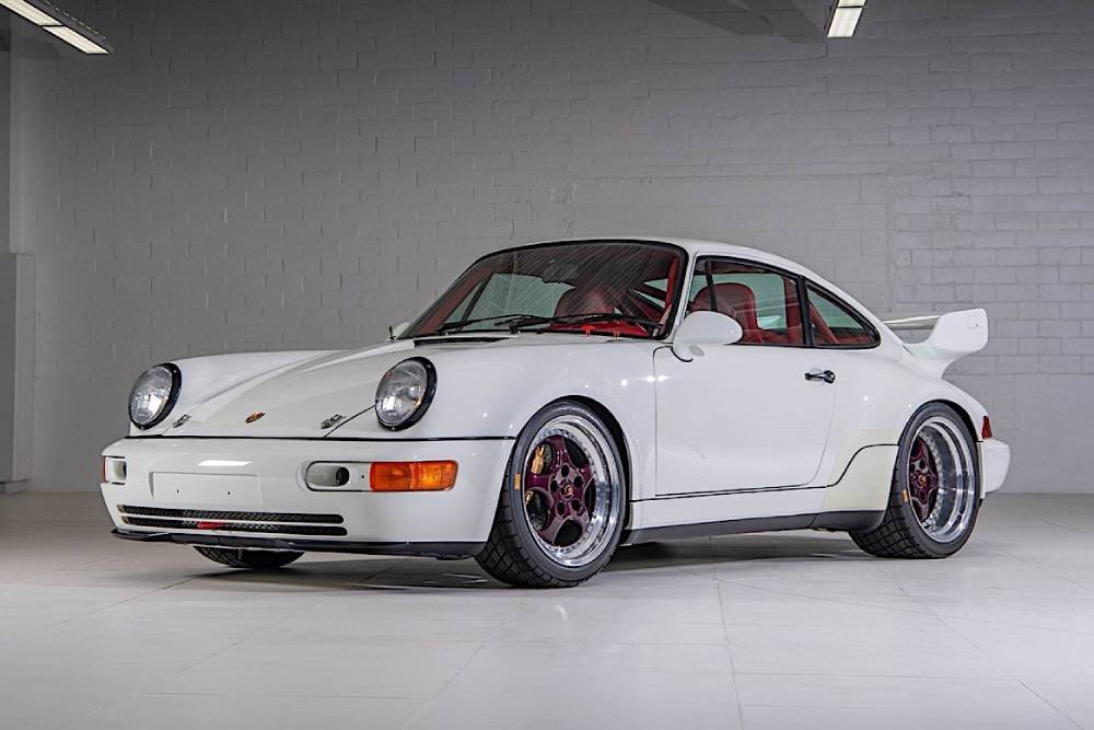 https://autogreeknews.gr/wp-content/uploads/2023/10/someone-is-selling-56-white-porsche-cars-in-one-go-7.jpg