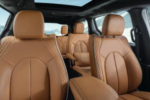 The new 2021 Chrysler Pacifica Pinnacle model offers the most luxurious interior in its class, with Caramel Nappa leather seats featuring quilted seat side bolsters and perforated seat inserts and seat backs on all three rows.