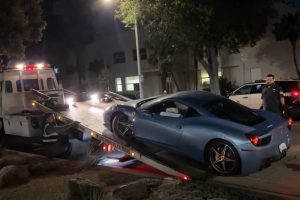 getting-a-crashed-ferrari-458-up-on-a-flatbed-truc