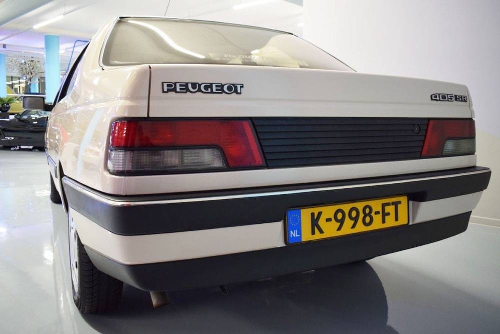 https://autogreeknews.gr/wp-content/uploads/2024/09/Peugeot_405_SR_1991_for_sale-12.jpg