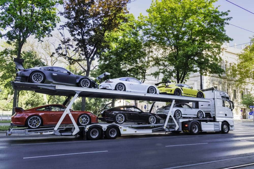 https://autogreeknews.gr/wp-content/uploads/2025/03/Six-Cars-One-Truck-The-Delivery-Mileage-Porsche-Co-3.jpg