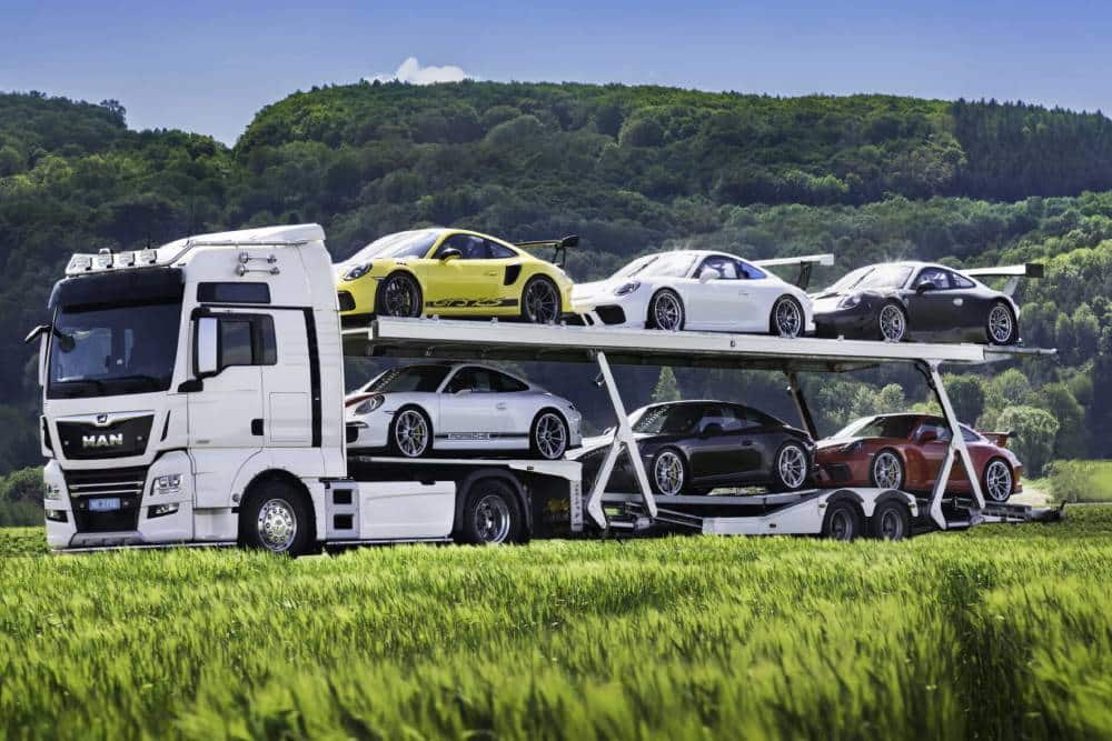 https://autogreeknews.gr/wp-content/uploads/2025/03/Six-Cars-One-Truck-The-Delivery-Mileage-Porsche-Co-4.jpg