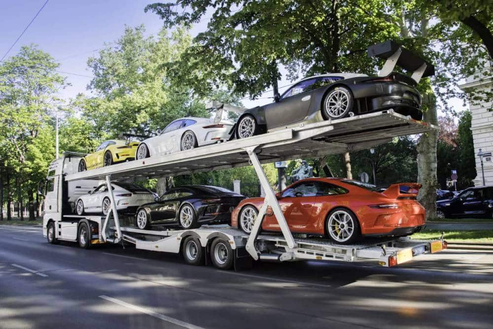 https://autogreeknews.gr/wp-content/uploads/2025/03/Six-Cars-One-Truck-The-Delivery-Mileage-Porsche-Co-5.jpg