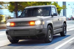 slate-truck—exterior-driving-on-a-road