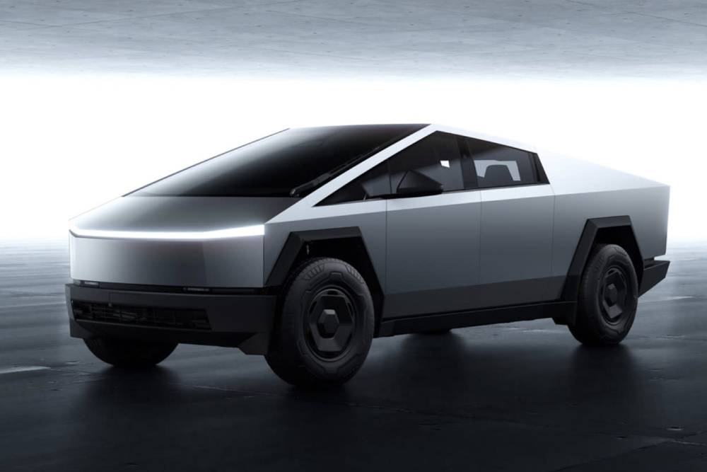https://autogreeknews.gr/wp-content/uploads/2025/04/tesla-launches-gutted-cybertruck-rwd-with-350-mile.jpg
