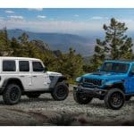 Rubicon 20th Anniversary editions: 2023 Jeep® Wrangler Rubicon 4xe (left, shown with optional Hinge-Gate Reinforcement by Mopar) and 2023 Jeep Wrangler Rubicon 392
