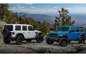 Rubicon 20th Anniversary editions: 2023 Jeep® Wrangler Rubicon 4xe (left, shown with optional Hinge-Gate Reinforcement by Mopar) and 2023 Jeep Wrangler Rubicon 392