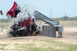 model 3 crashes barrier