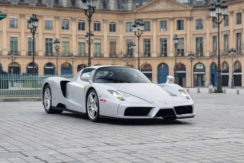 https://autogreeknews.gr/wp-content/uploads/2026/03/2004-Ferrari-Enzo-Auction-Silver-1-2048x1366-1.jpg