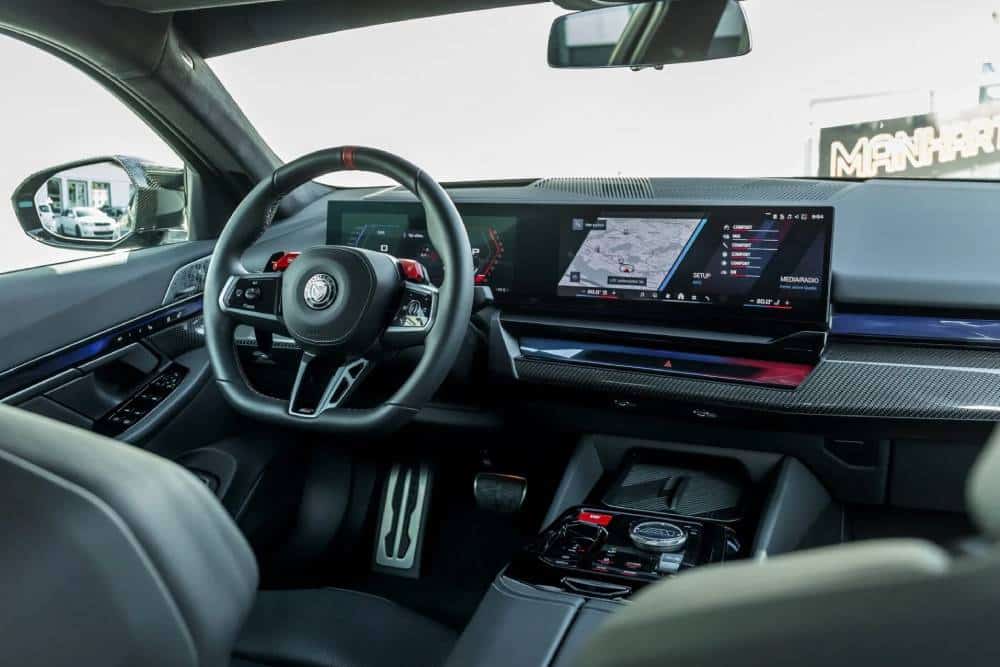 https://autogreeknews.gr/wp-content/uploads/2026/03/Manhart-BMW-M5-Touring-MH5-900E-24-2048x1366-1.jpg