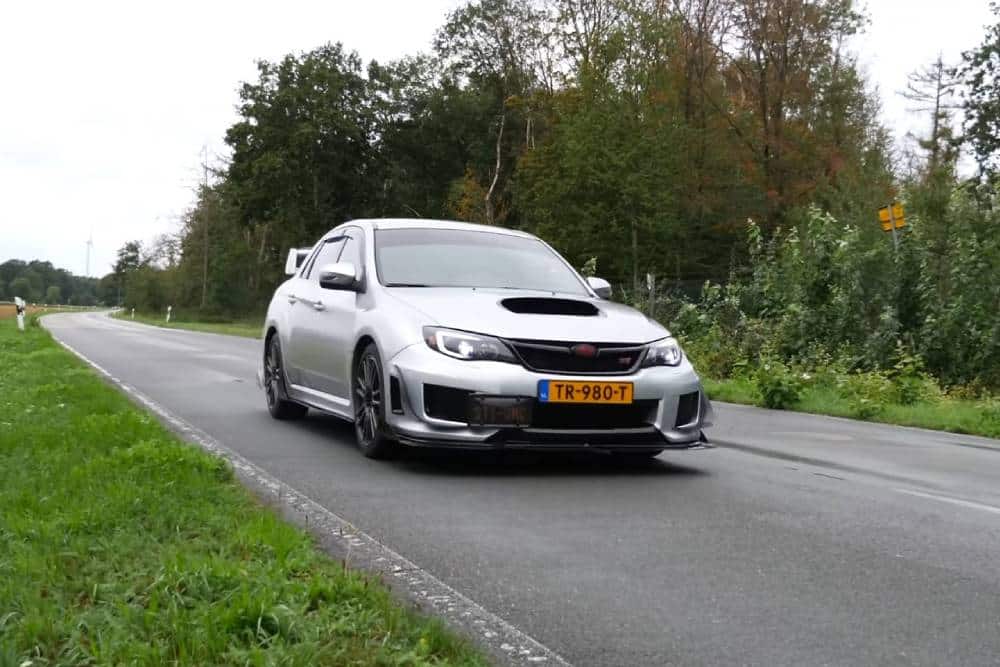 https://autogreeknews.gr/wp-content/uploads/2026/04/subaru-wrx-sti-flames-02.jpg