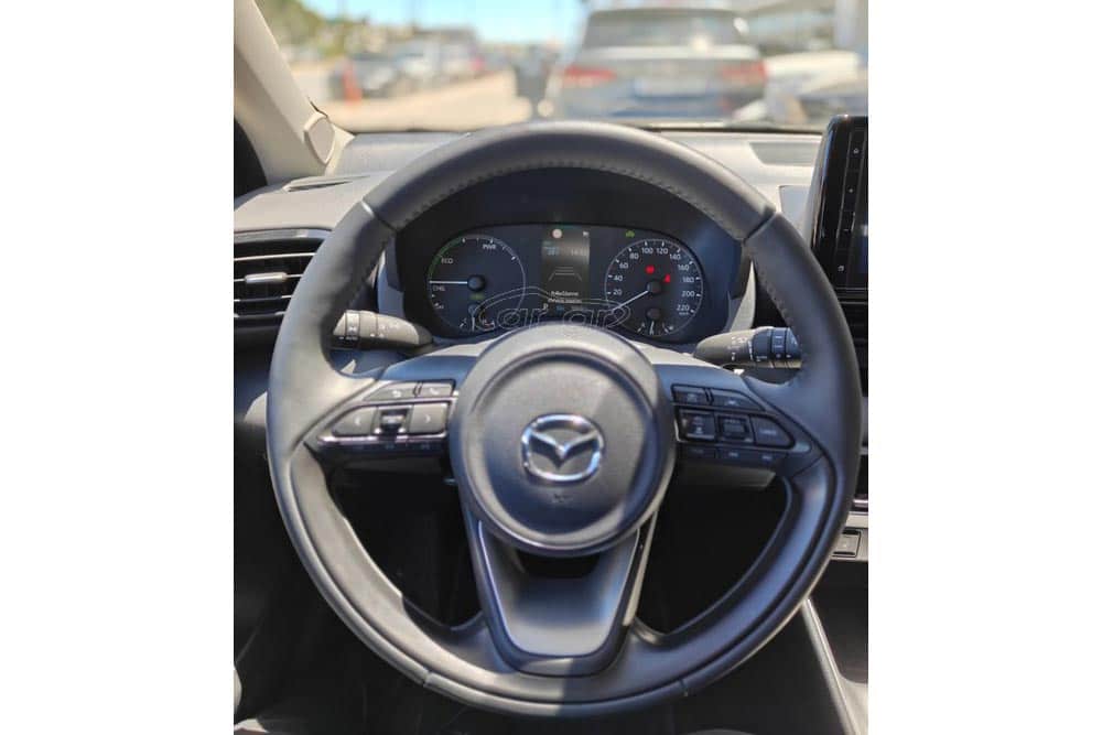 https://autogreeknews.gr/wp-content/uploads/2026/07/Mazda2-Hybrid-2025-used-7.jpg