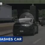 runaway tire smashes nissan 02