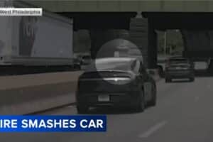 runaway tire smashes nissan 02